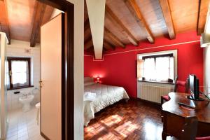 Postel nebo postele na pokoji v ubytování Relais Oroscopo