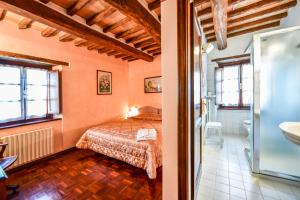 Postel nebo postele na pokoji v ubytování Relais Oroscopo