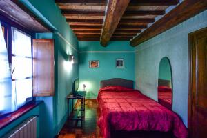 Postel nebo postele na pokoji v ubytování Relais Oroscopo