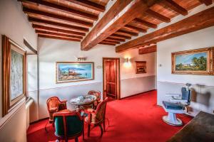 Posezení v ubytování Relais Oroscopo