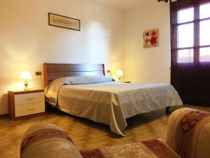 Postel nebo postele na pokoji v ubytování La Luna sul Tetto