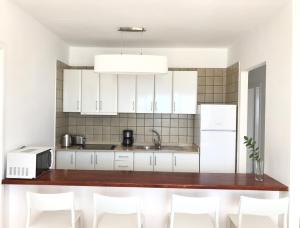 Kuchyňa alebo kuchynka v ubytovaní Apartamento Tabaybas