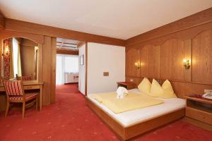 Posteľ alebo postele v izbe v ubytovaní Hotel Alt Vent Tyrol