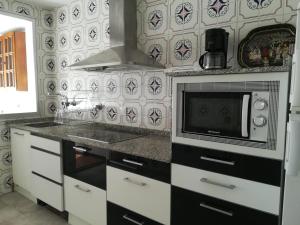 Кухня або міні-кухня у Casamami