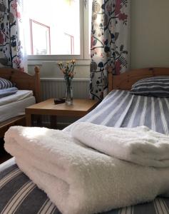 Postel nebo postele na pokoji v ubytování Solviken Tranås Hostel