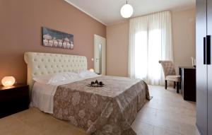 Postel nebo postele na pokoji v ubytování Hotel La Campana