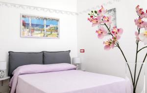 Posteľ alebo postele v izbe v ubytovaní Capri Dreaming