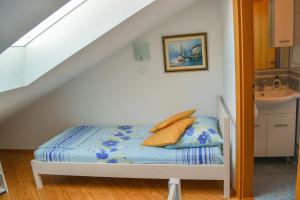 Postel nebo postele na pokoji v ubytování Apartment Sopta