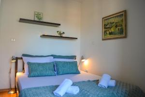 Postel nebo postele na pokoji v ubytování Apartment Sopta