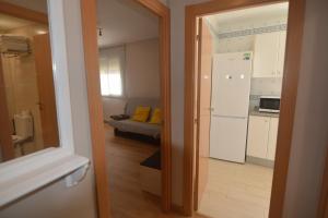 Kuchyň nebo kuchyňský kout v ubytování Palfuriana 86, a 30 metros de la playa WIFI ideal con niños (12)