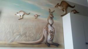a painting of a cat and deer on a wall at Il Mondo B&B in Fiumicino