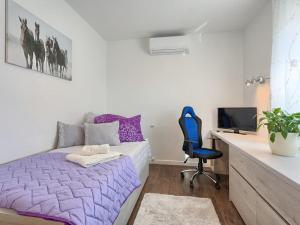 Posteľ alebo postele v izbe v ubytovaní Vacation Home Bokan
