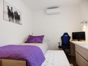 Posteľ alebo postele v izbe v ubytovaní Vacation Home Bokan