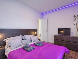 Posteľ alebo postele v izbe v ubytovaní Vacation Home Bokan