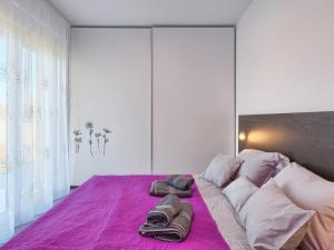Posteľ alebo postele v izbe v ubytovaní Vacation Home Bokan
