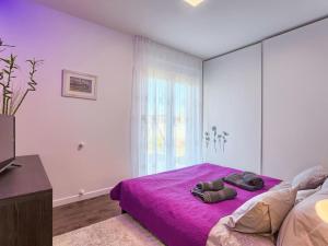 Posteľ alebo postele v izbe v ubytovaní Vacation Home Bokan