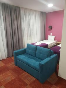 Posezení v ubytování Carina Hotel