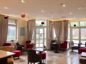 Posezení v ubytování Hotel Maj Inn