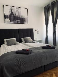 Postel nebo postele na pokoji v ubytování Apartmani SB 42