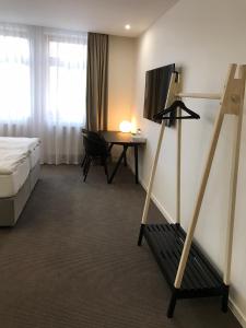 Posteľ alebo postele v izbe v ubytovaní Rozmaryn Hotel B&B