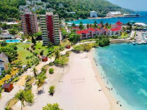 an aerial view of a beach in a resort at Beach PentHouse A25 Sandcastles in Ocho Rios