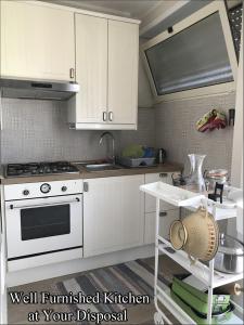 Η κουζίνα ή μικρή κουζίνα στο Giuly'S House Cozy & Comfy Apartment in Rome ....Real Rome !!!