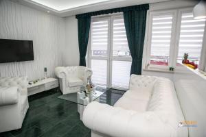 Posedenie v ubytovaní Royal Apartment in City Centre