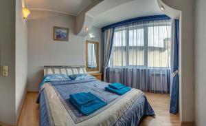 Кровать или кровати в номере Klimenko House