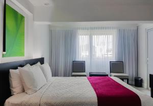 Voodi või voodid majutusasutuse R Hotel Kingston toas