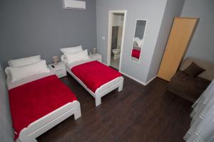 Postel nebo postele na pokoji v ubytování Villa M