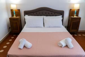 Postel nebo postele na pokoji v ubytování Residence Le Cure