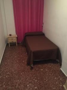 Posteľ alebo postele v izbe v ubytovaní Has encontrado lo que buscabas...