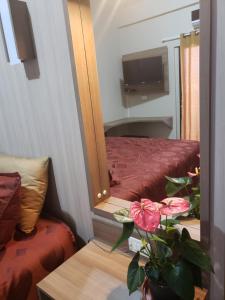 Zona de estar de Class Apart Hotel