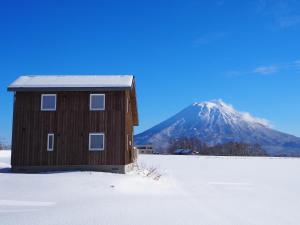 Niseko Highland Cottages žiemą