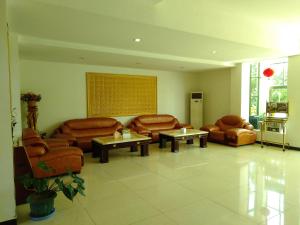 Uma área de estar em Excelsior Resort