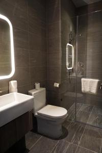 Koupelna v ubytování Urban H Hotel