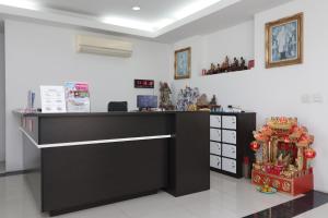 una tienda con un mostrador y un mostrador sidx sidx sidx sidx sidx sidx en Hua Hin Irooms, en Hua Hin