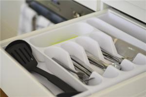 a drawer with utensils and a knife and fork at Alora Apartment in Sydney CBD - Darling Harbour in Sydney