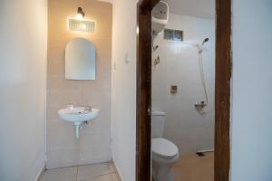 Koupelna v ubytování Apartmen Kak Okoh