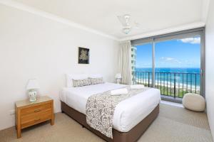 Кровать или кровати в номере Majorca Isle Beachside Resort