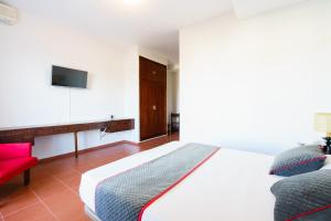 Cama o camas de una habitación en Venta del Alto Hotel las Cumbres by Vivere Stays