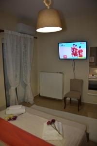 A bed or beds in a room at Myrto2 apartment