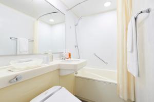 Kylpyhuone majoituspaikassa RIHGA PLACE HIGOBASHI