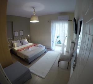 A bed or beds in a room at Myrto2 apartment