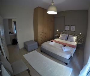 A bed or beds in a room at Myrto2 apartment