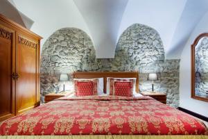 Postel nebo postele na pokoji v ubytování Arcadia Boutique Hotel