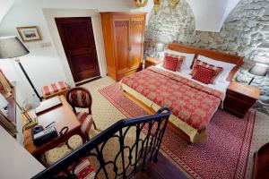 Postel nebo postele na pokoji v ubytování Arcadia Boutique Hotel