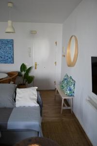 Μια τηλεόραση ή/και κέντρο ψυχαγωγίας στο Casa "La Breña". Surf,sol y relax.