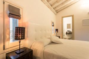 Postel nebo postele na pokoji v ubytování La Petite Maison + 37 fotografií