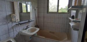 Koupelna v ubytování Ri Jing Yuan Homestay + 27 fotografií